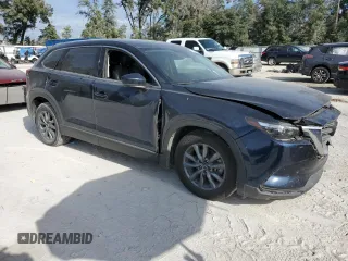 2020 Mazda CX-9 Touring with VIN JM3TCACY0L0421773, listed as a Copart auction lot 58373945 with 106,698 mi miles and Non repairable. Bid and sale history available at DreamBid. Image 4.