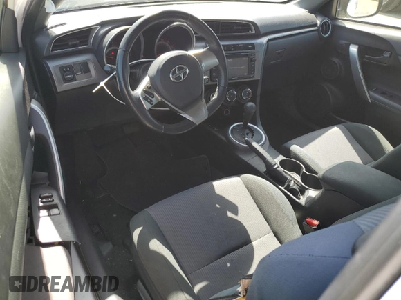 2014 Scion tC z VIN JTKJF5C71E3082375, wystawiony jako Copart lot #56909095 z przebiegiem 140 165 mil mil oraz Szkoda całkowita • Salvage title. Historia ofert i sprzedaży dostępna na DreamBid. Obrazek 8.