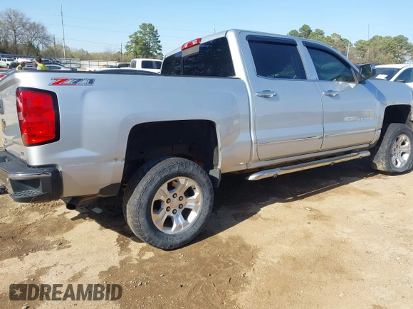 2015 Chevrolet Silverado 1500 LTZ with VIN 3GCUKSEC6FG171415, listed as a IAAI auction lot 41811018 with 171,295 mi miles and . Bid and sale history available at DreamBid. Image 4.