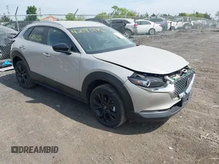 2024 Mazda CX-30 2.5 S Select Sport with VIN 3MVDMBBM0RM698412, listed as a IAAI auction lot 42093892 with 24,454 mi miles. Bid and sale history available at carsss.com. Image 1.
