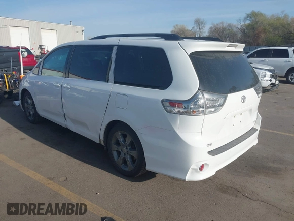 2012 Toyota Sienna SE with VIN 5TDXK3DC1CS221798, listed as a IAAI auction lot 41989210 with 198,962 mi miles. Bid and sale history available at carsss.com. Image 3.