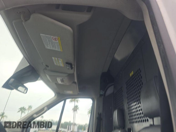 2019 Ford Transit with VIN 1FTYR2CM9KKB04450, listed as a IAAI auction lot 42849742 with 222,192 mi miles and . Bid and sale history available at DreamBid. Image 11.