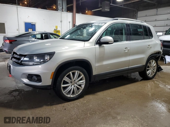 2013 Volkswagen Tiguan SE z VIN WVGBV3AX1DW579506, wystawiony jako Copart lot #52719575 z przebiegiem 163 471 mil mil oraz Szkoda całkowita • Salvage title. Historia ofert i sprzedaży dostępna na DreamBid. Obrazek 1.