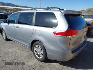 2011 Toyota Sienna XLE AAS with VIN 5TDYK3DC2BS153417, listed as a IAAI auction lot 41685324 with 158,195 mi miles. Bid and sale history available at carsss.com. Image 3.