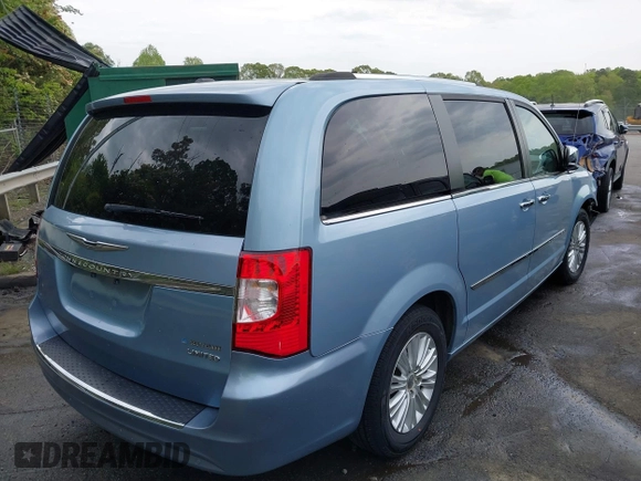 2013 Chrysler Town & Country Limited with VIN 2C4RC1GG5DR571731, listed as a IAAI auction lot 42028807 with 155,875 mi miles. Bid and sale history available at carsss.com. Image 4.