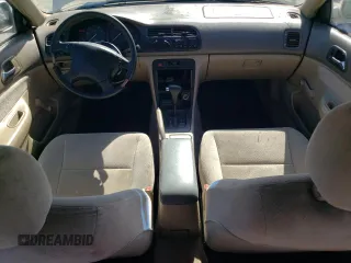 1996 Honda Accord Value with VIN 1HGCD5691TA249900, listed as a Copart auction lot 77683144 with 155,178 mi miles and Salvage Title. Bid and sale history available at DreamBid. Image 8.