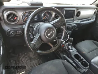 2020 Jeep Wrangler Sport with VIN 1C4GJXAGXLW237080, listed as a Copart auction lot 57769704 with 144,137 mi miles and Salvage title. Bid and sale history available at DreamBid. Image 8.