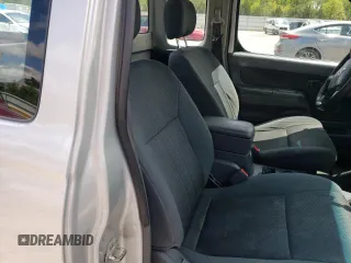 2004 Nissan Frontier XE with VIN 1N6DD26T34C454425, listed as a Copart auction lot 52404115 with 317,899 mi miles and Salvage title. Bid and sale history available at DreamBid. Image 10.
