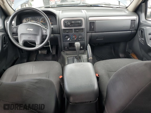 2004 Jeep Grand Cherokee Laredo with VIN 1J4GW48S04C125931, listed as a Copart auction lot 59972695 with 198,403 mi miles and Salvage title. Bid and sale history available at DreamBid. Image 8.