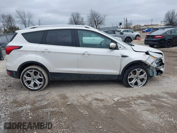 2019 Ford Escape Titanium with VIN 1FMCU9J95KUB50793, listed as a IAAI auction lot 41501161 with 111,644 mi miles. Bid and sale history available at carsss.com. Image 13.