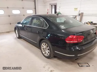 2013 Volkswagen Passat SEL Premium with VIN 1VWCP7A37DC068954, listed as a IAAI auction lot 42019750 with 127,943 mi miles. Bid and sale history available at carsss.com. Image 3.