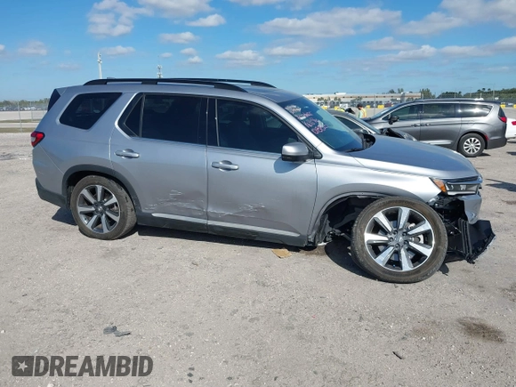 2023 Honda Pilot Elite with VIN 5FNYG1H83PB018826, listed as a IAAI auction lot 41301261 with 23,252 mi miles. Bid and sale history available at carsss.com. Image 1.