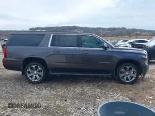 2015 Chevrolet Suburban LT with VIN 1GNSKJKC8FR717435, listed as a IAAI auction lot 41313726 with 120,731 mi miles and . Bid and sale history available at DreamBid. Image 13.