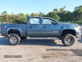 2010 GMC Sierra 1500 SLE z VIN 3GTRKVE30AG239997, wystawiony jako IAAI lot #42056748 z przebiegiem 159 931 mil mil oraz . Historia ofert i sprzedaży dostępna na DreamBid. Obrazek 14.