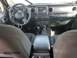 2019 Jeep Wrangler Unlimited Sport S with VIN 1C4HJXDG7KW603821, listed as a Copart auction lot 55846875 with 37,711 mi miles and Salvage title. Bid and sale history available at DreamBid. Image 8.