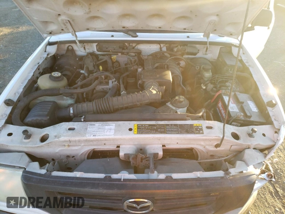 2005 Mazda B-Series 2WD Truck with VIN 4F4YR12DX5PM02810, listed as a Copart auction lot 82188324 with 203,619 mi miles and Salvage Title. Bid and sale history available at carsss.com. Image 11.