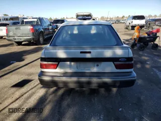 1989 Ford Escort z VIN 1FAPP9090KW279114, wystawiony jako Copart lot #83614994 z przebiegiem 60 585 mil mil oraz Nie do naprawy. Historia ofert i sprzedaży dostępna na DreamBid. Obrazek 6.