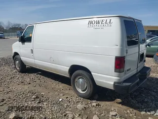 2005 Ford Econoline Cargo with VIN 1FTNE24L15HA46713, listed as a IAAI auction lot 41727365 with 424,135 mi miles. Bid and sale history available at carsss.com. Image 3.