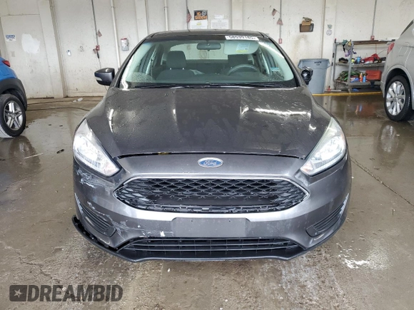 2016 Ford Focus SE z VIN 1FADP3F22GL298136, wystawiony jako Copart lot #58539185 z przebiegiem 101 580 mil mil oraz Szkoda całkowita • Salvage title. Historia ofert i sprzedaży dostępna na DreamBid. Obrazek 5.