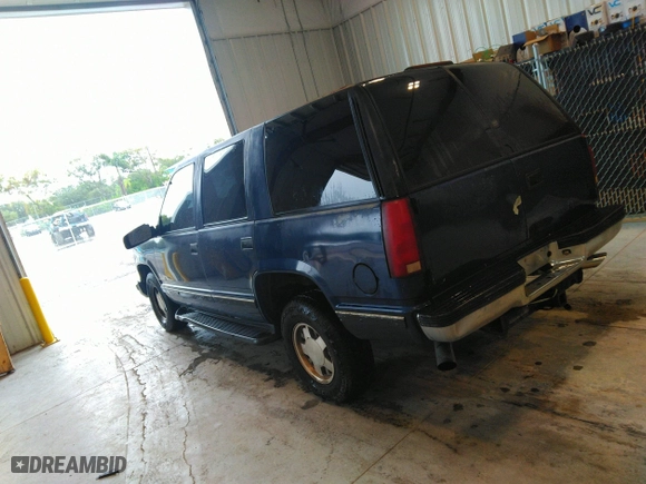 1999 Chevrolet Tahoe with VIN 1GNEC13R9XJ536325, listed as a IAAI auction lot 41475643 with 206,804 mi miles. Bid and sale history available at carsss.com. Image 3.