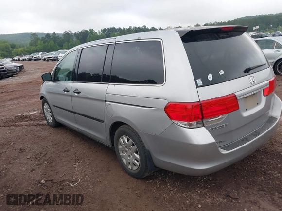 2010 Honda Odyssey LX with VIN 5FNRL3H21AB100181, listed as a IAAI auction lot 42258010 with 246,463 mi miles and . Bid and sale history available at DreamBid. Image 3.