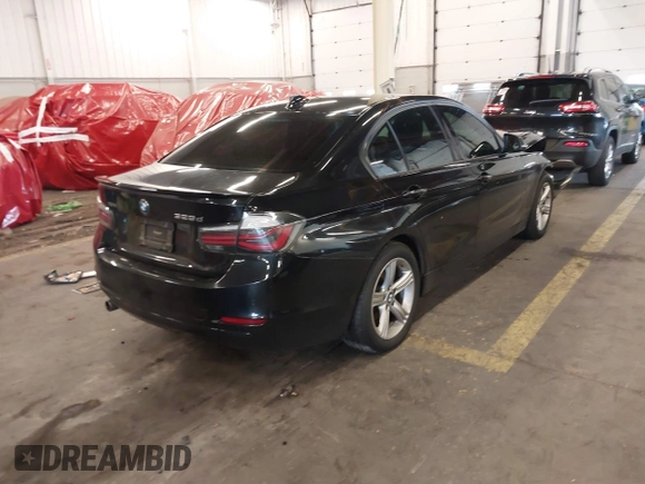 2014 BMW 3 Series 328d xDrive with VIN WBA3D5C58EKX95300, listed as a IAAI auction lot 41539957 with 133,382 mi miles. Bid and sale history available at carsss.com. Image 4.