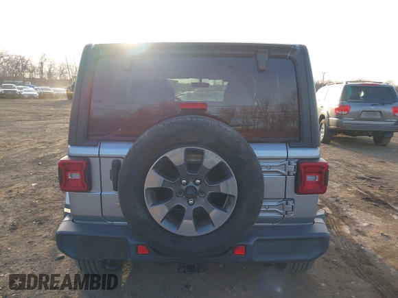 2018 Jeep Wrangler Unlimited Sahara z VIN 1C4HJXEN4JW173435, wystawiony jako IAAI lot #41453040 z przebiegiem 51 530 mil mil oraz . Historia ofert i sprzedaży dostępna na DreamBid. Obrazek 16.