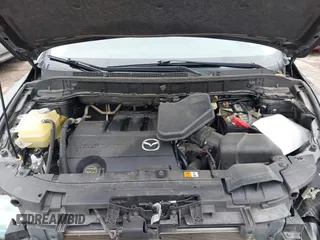 2014 Mazda CX-9 Touring with VIN JM3TB2CA1E0427984, listed as a IAAI auction lot 41620770 with 88,305 mi miles and . Bid and sale history available at DreamBid. Image 10.