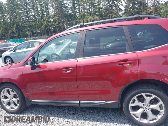2017 Subaru Forester Touring with VIN JF2SJATC9HH576959, listed as a IAAI auction lot 42550955 with 138,810 mi miles and . Bid and sale history available at DreamBid. Image 15.