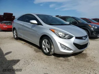 2013 Hyundai Elantra Coupe GS PZEV with VIN KMHDH6AE2DU011583, listed as a Copart auction lot 74499184 with 69,391 mi miles and Non Repairable. Bid and sale history available at carsss.com. Image 4.