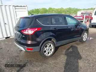 2013 Ford Escape SEL с VIN 1FMCU9HXXDUD49555, выставлен на аукционе IAAI как лот 42042351 с пробегом 124 671 миль миль и . История ставок и продаж доступна на DreamBid. Изображение 4.