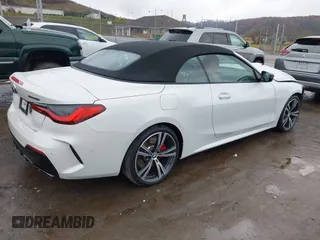 2023 BMW 4 Series M440i xDrive with VIN WBA63AT04PCL70876, listed as a IAAI auction lot 40777902 with 21,944 mi miles. Bid and sale history available at carsss.com. Image 4.