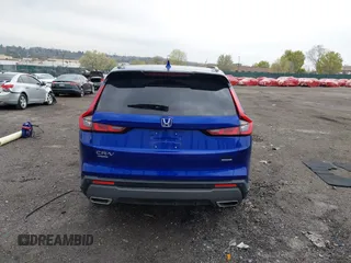 2025 Honda CR-V Sport Touring with VIN 2HKRS6H99SH807839, listed as a IAAI auction lot 42029547 with 5,979 mi miles and . Bid and sale history available at DreamBid. Image 17.