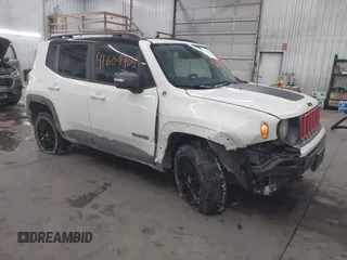 2018 Jeep Renegade Trailhawk z VIN ZACCJBCB2JPH68075, wystawiony jako IAAI lot #41609405 z przebiegiem 131 139 mil mil oraz . Historia ofert i sprzedaży dostępna na DreamBid. Obrazek 1.