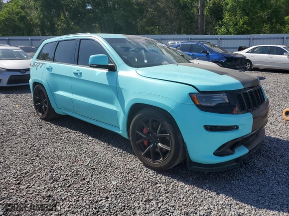 2015 Jeep Grand Cherokee SRT with VIN 1C4RJFDJXFC861588, listed as a Copart auction lot 51301235 with 35,927 mi miles and Clean Title. Bid and sale history available at carsss.com. Image 4.