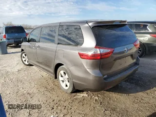 2018 Toyota Sienna L with VIN 5TDZZ3DCXJS931025, listed as a Copart auction lot 49206645 with 141,125 mi miles and Clean Title. Bid and sale history available at DreamBid. Image 2.