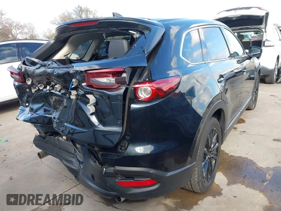 2023 Mazda CX-9 Touring Plus with VIN JM3TCBAY2P0657761, listed as a IAAI auction lot 41125586 with 12,425 mi miles and . Bid and sale history available at DreamBid. Image 4.