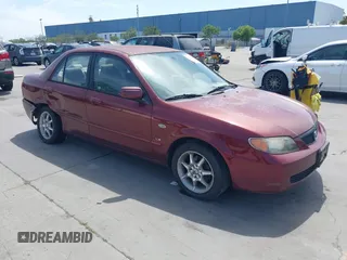2002 Mazda Protege DX with VIN JM1BJ225621608984, listed as a IAAI auction lot 42106167 with 158,662 mi miles and . Bid and sale history available at DreamBid. Image 1.