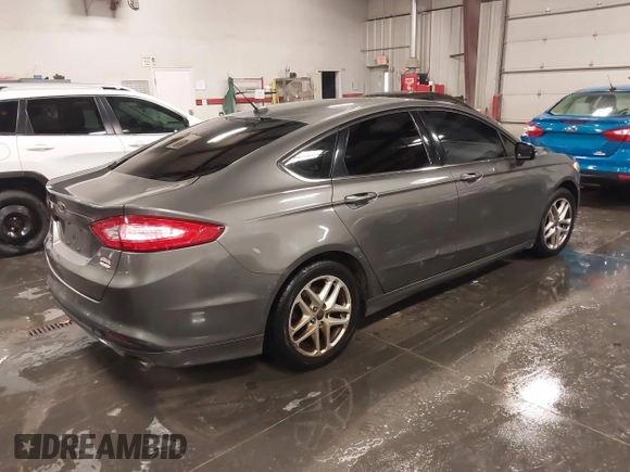 2014 Ford Fusion SE with VIN 3FA6P0H7XER242959, listed as a IAAI auction lot 41162453 with 239,528 mi miles. Bid and sale history available at carsss.com. Image 4.