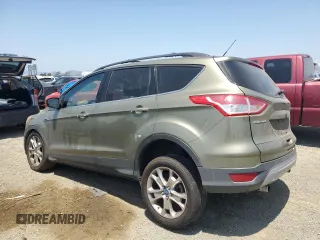 2013 Ford Escape SE with VIN 1FMCU0GX4DUB91663, listed as a Copart auction lot 59167195 with 115,081 mi miles and Salvage title. Bid and sale history available at DreamBid. Image 2.