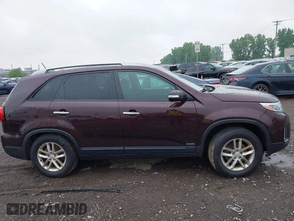 2015 Kia Sorento LX with VIN 5XYKTCA63FG585728, listed as a IAAI auction lot 42424806 with 191,894 mi miles and . Bid and sale history available at DreamBid. Image 14.