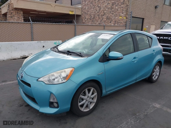 2013 Toyota Prius c One with VIN JTDKDTB33D1055466, listed as a IAAI auction lot 39803165 with 173,123 mi miles. Bid and sale history available at carsss.com. Image 2.