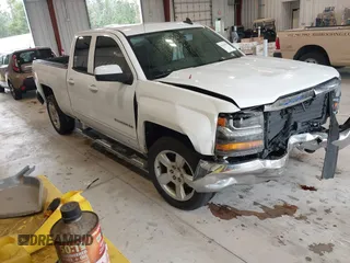 2018 Chevrolet Silverado 1500 LT with VIN 1GCRCREC0JZ204834, listed as a IAAI auction lot 41363579 with 135,247 mi miles and . Bid and sale history available at DreamBid. Image 1.