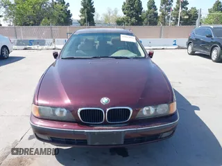 1998 BMW 5 Series 540iA with VIN WBADE6325WBW59821, listed as a IAAI auction lot 42063032 with 199,693 mi miles. Bid and sale history available at carsss.com. Image 6.