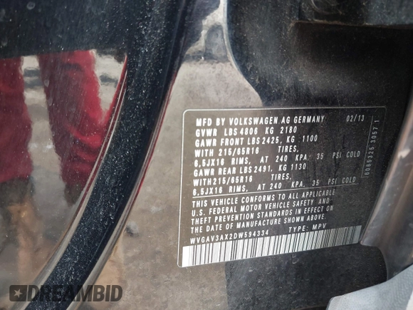 2013 Volkswagen Tiguan S with VIN WVGAV3AX2DW594334, listed as a IAAI auction lot 42405989 with 96,559 mi miles and . Bid and sale history available at DreamBid. Image 9.