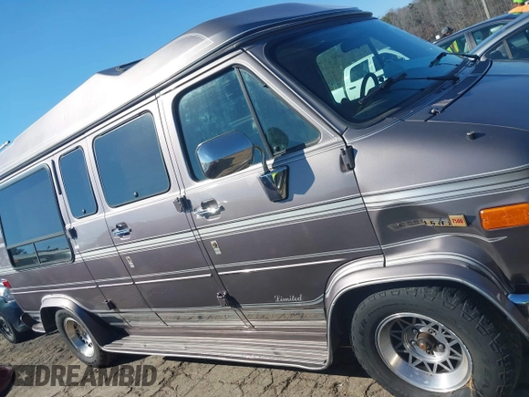 1993 GMC Vandura z VIN 1GDEG25KXPF515274, wystawiony jako IAAI lot #41663966 z przebiegiem 112 288 mil mil oraz . Historia ofert i sprzedaży dostępna na DreamBid. Obrazek 13.