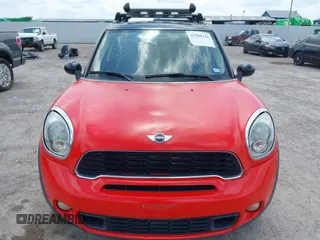 2011 MINI Countryman S z VIN WMWZC5C52BWL53856, wystawiony jako IAAI lot #42368316 z przebiegiem 107 318 mil mil oraz . Historia ofert i sprzedaży dostępna na DreamBid. Obrazek 6.