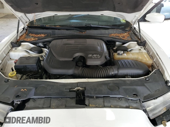 2012 Dodge Charger SE with VIN 2C3CDXBG1CH146027, listed as a Copart auction lot 55129565 with 219,879 mi miles and Salvage Title. Bid and sale history available at DreamBid. Image 11.