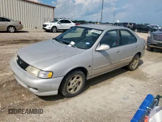 1999 Nissan Sentra XE with VIN 1N4AB41D7XC720661, listed as a Copart auction lot 64336985 with 69,999 mi miles and Clean title. Bid and sale history available at DreamBid. Image 1.