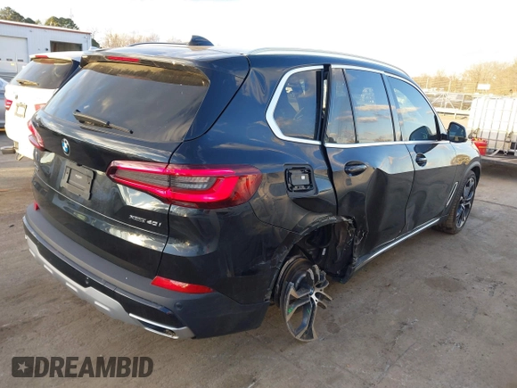 2021 BMW X5 xDrive40i with VIN 5UXCR6C08M9D76272, listed as a IAAI auction lot 41219782 with 56,599 mi miles and . Bid and sale history available at DreamBid. Image 6.